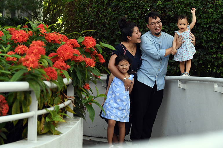 Ms Fiona Kwen with her husband Mr Lee Han Xiang and daughters Zoe and Sage. 