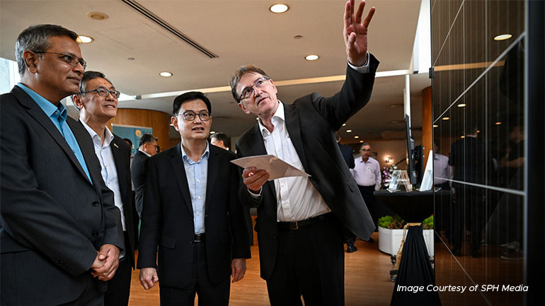 Deputy Prime Minister Heng Swee Keat (third from left) being briefed by Professor Armin Aberle (right) at the launch of the REC@NUS Corporate Lab on June 16.