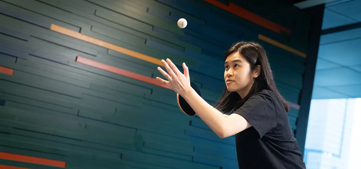 A sporting spirit in tech: How Wan Qi’s perseverance fuels success at Google masthead image