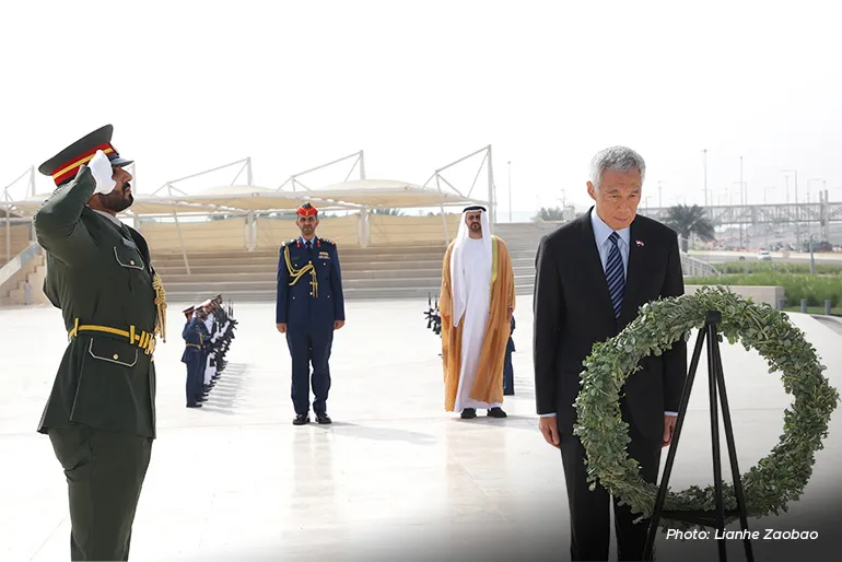PM Lee Hsien Loong laying a wreath at the Oasis of Dignity, a war memorial and monument in Abu Dhabi, on October 22. 