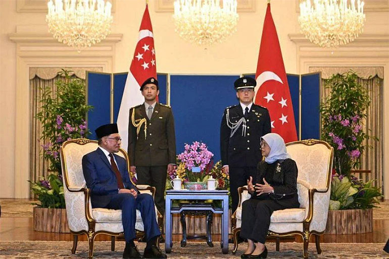 PM Anwar meets President Halimah at the Istana on Jan 30, 2023. Image courtesy of SPH Media.