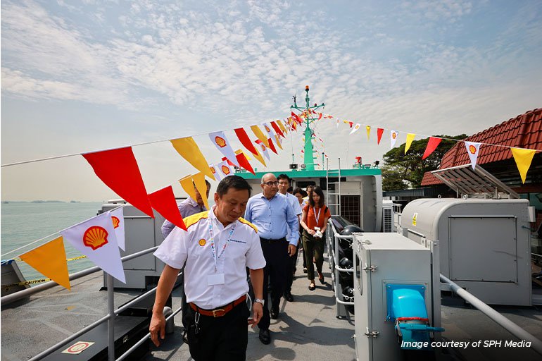 Transport Minister S. Iswaran during a tour of Shell's electric ferry at Pulau Bukom.