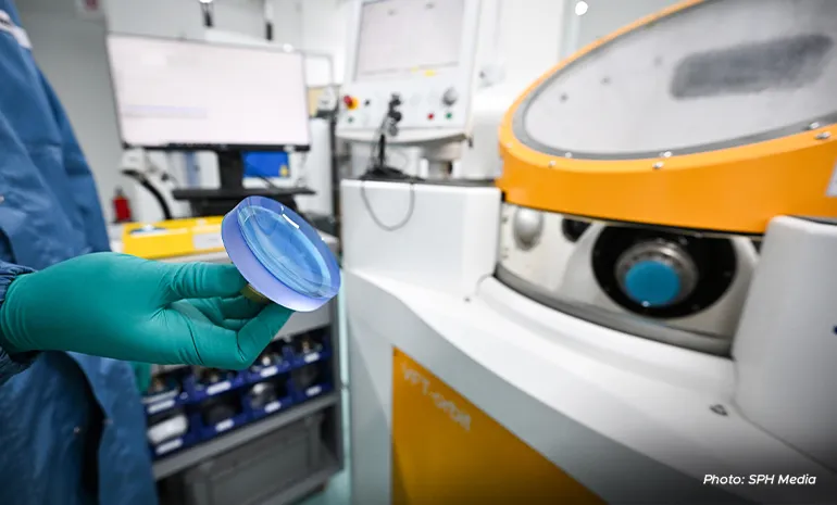 R&D engineer Mazlan Leman showing an ophthalmic lens in the fabrication lab of the Centre for Innovation & Technologies.