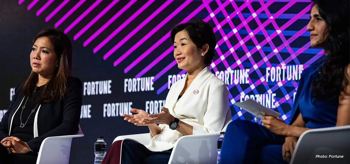 Su Shan Tan, head of institutional banking at DBS (left), and Jacqueline Poh, managing director of the Singapore Economic Development Board (center), speaking at Fortune Brainstorm AI Singapore.