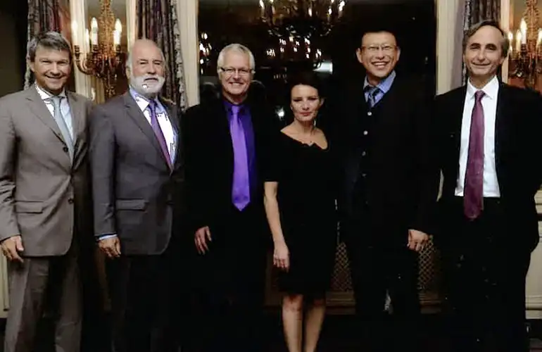 Martin being honoured as Master Perfumer, with then-CEO and current Vice-Chairman Patrick Firmenich (far left).