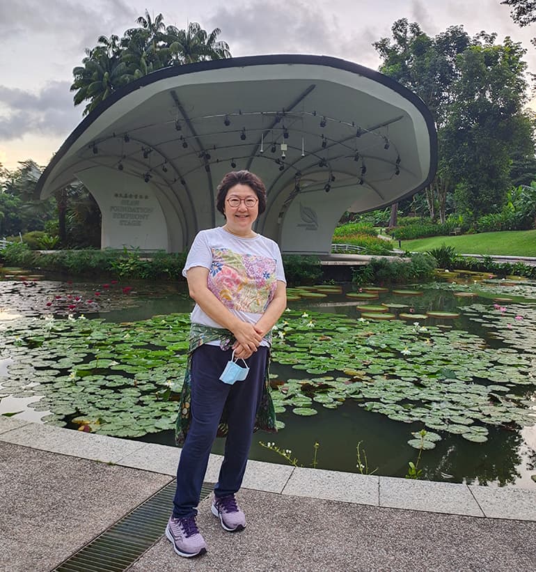 Alice loves the greenery in Singapore and takes daily walks in the Botanic Gardens.