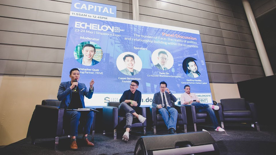 Christopher moderating a panel discussion at Echelon 2019. 