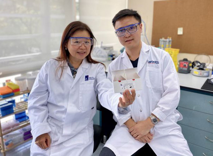 Dr Sidney Yee, CEO of Diagnostics Development Hub (left), and Dr Zhou Lihan, CEO and co-founder of MiRXES, with the SARS-CoV-2 diagnostic test kit developed by A*Star. PHOTO: A*STAR