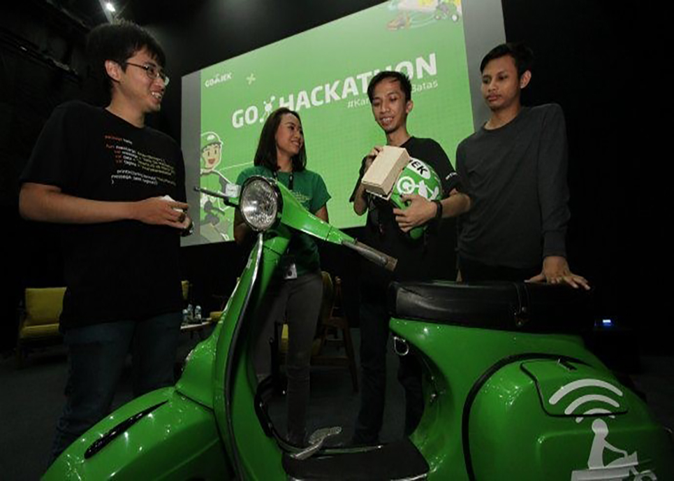 (From left to right) Andre Susanto of SAILYY, GO-JEK Indonesia HR Director Monica Oudang, Muhammad Mustadi of SSX_Ceria, and Mochammad Fatchur Rahman of Quantum Sigmoid. SAILYY, SSX_Ceria, and Quantum Sigmoid were the three winners of Go-Jek’s first hackathon Go-Hackathon in 2017. Image Credit: Go-Jek