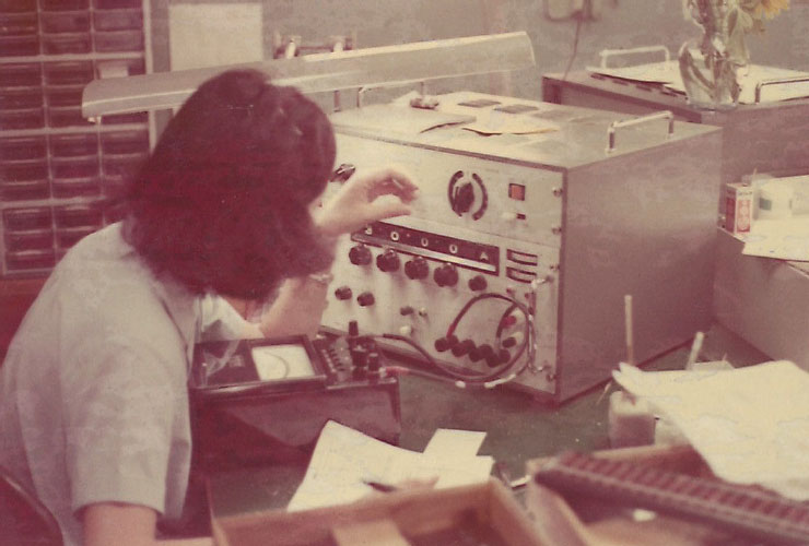 1975 lady operating the server.